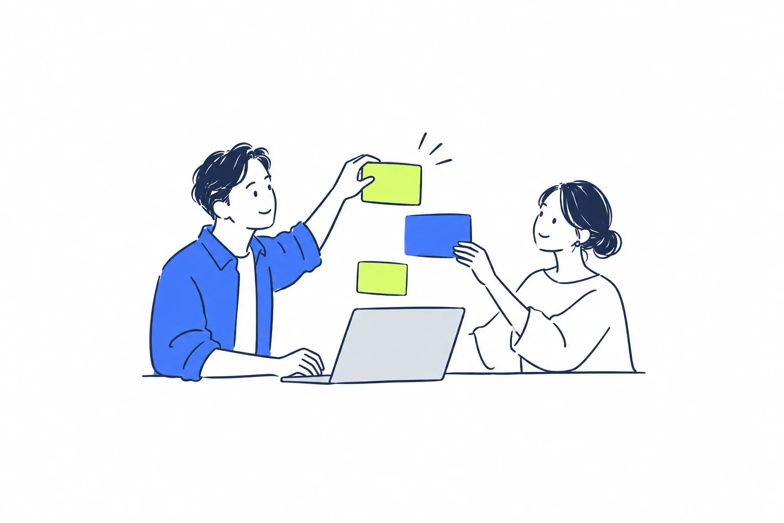 パソコンの周りでアイデアを形にする二人のイラスト